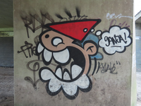 848548 Afbeelding van graffiti met een lachende Utrechtse kabouter (KBTR), in de tunnel onder de A12 bij de ...